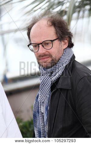 CANNES, FRANCE - MAY 21: Denis Podalydes poses at 'Vous N'avez Encore Rien Vu' Photocall during the 65th Annual Cannes Film Festival at Palais des Festivals on May 21, 2012 in Cannes, France.