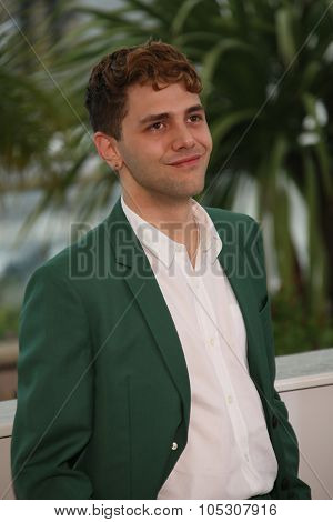 CANNES, FRANCE - MAY 22: Director Xavier Dolan attends the 'Mommy' photocall during the 67th Annual Cannes Film Festival on May 22, 2014 in Cannes, France.
