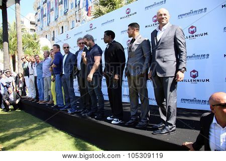 CANNES, FRANCE - MAY 18: Dolph Lundgren, Jason Statham, Harrison Ford, Mel Gibson, Sylvester Stallone attend a photocall for 'The Expendables 3' at the Carlton Hotel on May 18, 2014 in Cannes, France.