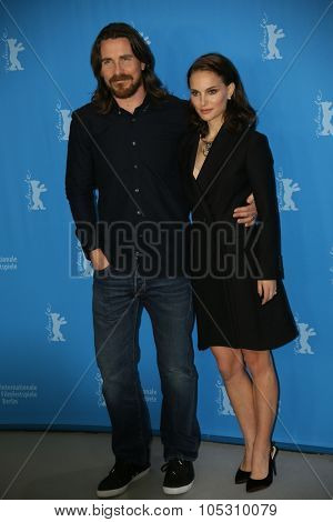 BERLIN, GERMANY - FEBRUARY 08:  Christian Bale, Natalie Portman pose during the photocall of 'Knight of Cups' within the 65th Berlin Film Festival in Berlin, Germany on February 08, 2015.