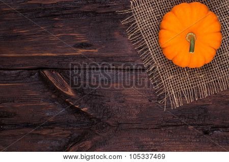 Pumpkin On A Wooden Table
