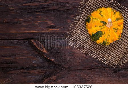 Pumpkin On A Wooden Table