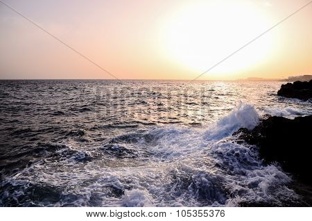 Strong Waves Crashing on the Volcanic Coast