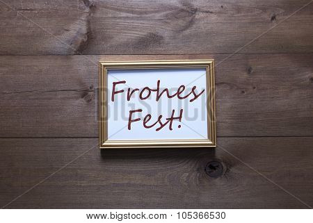Golden Picture Frame With Frohes Fest Means Merry Christmas