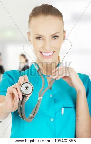 Beautiful smiling caucasian woman doctor with stethoscope.