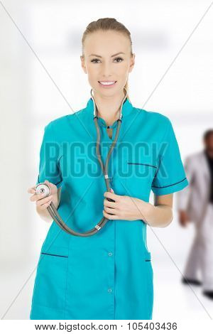 Beautiful smiling caucasian woman doctor with stethoscope.
