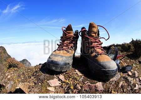 Hiking Boots On Beautiful Mountain Peak