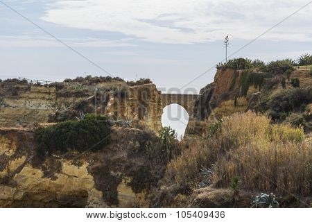 landscape bridge among the rocks near the beach Praia do Camilo in Lagos in Portugal