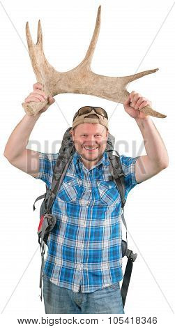 Tourist man with backpack standing with horns on scenerywhite background
