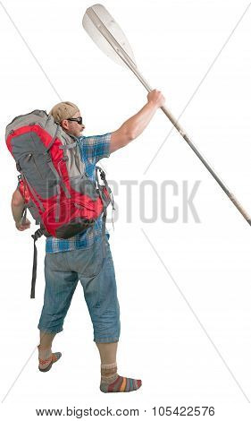 Tourist man with backpack and paddle