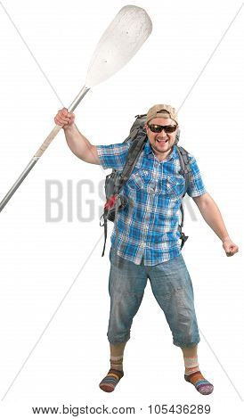 Tourist man with backpack and paddle