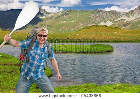 Tourist man on mountain river background