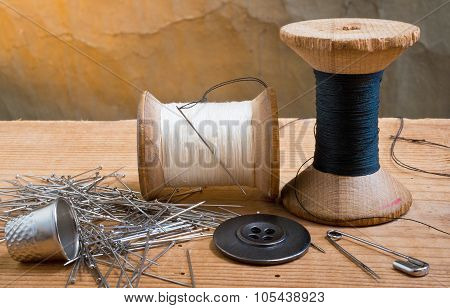 Two Spools Of Thread