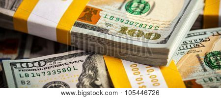 Creative business finance making money concept -  letterbox panoramic background of new 100 US dollars 2013 edition banknotes (bills) bundles close up