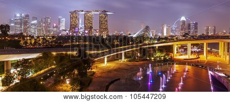 Panorama of Singapore skyline illumintaed in the evening twilight