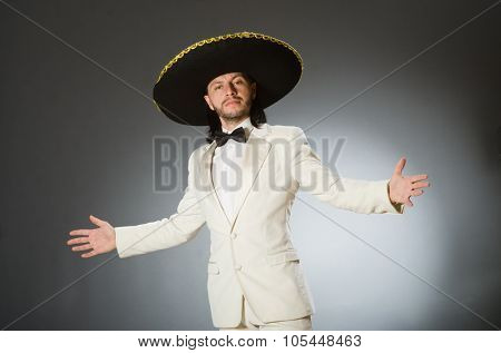 Person wearing sombrero hat in funny concept