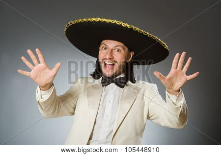 Person wearing sombrero hat in funny concept