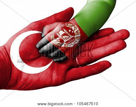 Adult Man Holding A Baby Hand With Turkey And Afghanistan Flags Overlaid. Isolated On White