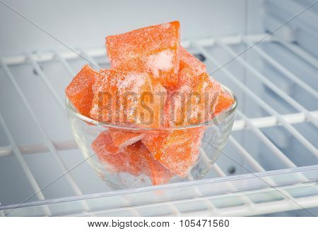 Sliced Frozen Pumpkin In The Freezer