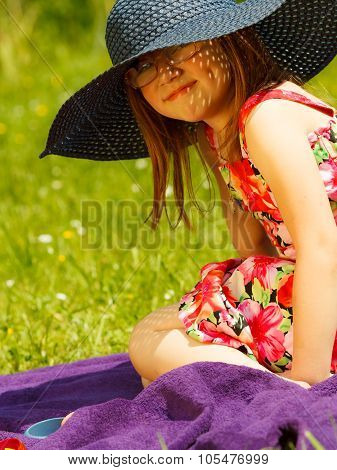 Cute Little Girl In Big Hat Pretending To Be Lady