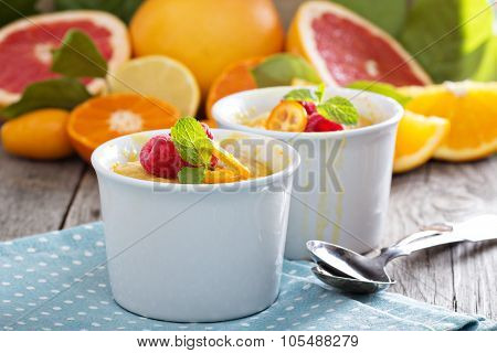 Citrus pudding in white ramekins