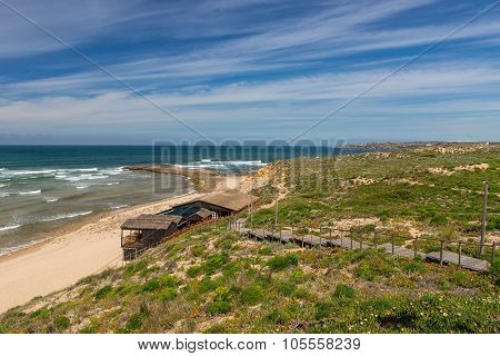 Seascape Of The Portuguese Village In The Summer. Villa Milfontes.