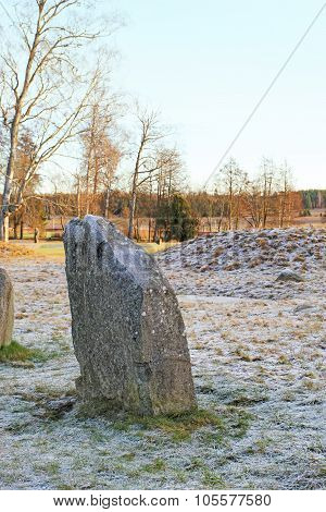 The Big Stones Standing In The Snow Field In Winter