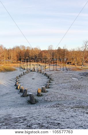 The Big Stones Standing In The Snow Field In Winter