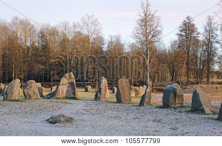 The Big Stones Standing In The Snow Field In Winter