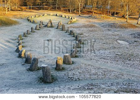 The Big Stones Standing In The Snow Field In Winter