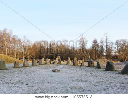 The Big Stones Standing In The Snow Field In Winter