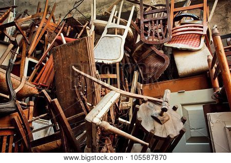 Wooden Chairs And Vintage Chairs, Thrown Into The Street