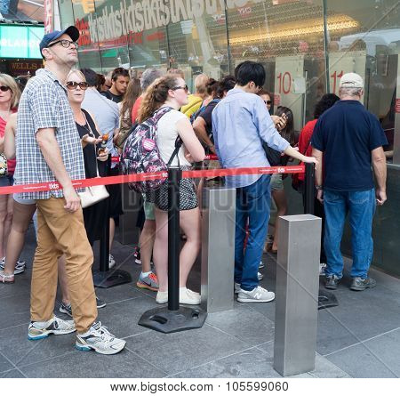 NEW YORK,USA - AUGUST 14,2015 : People at The TKTS booth on Times Square  buying tickets to Broadway shows