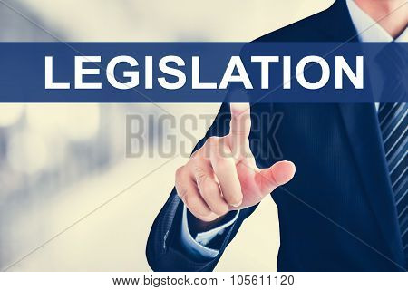 Businessman Hand Touching Legislation Tab On Virtual Screen