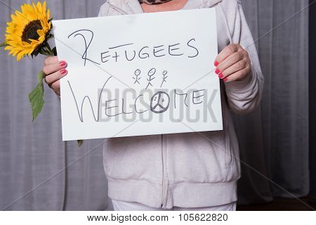 Female Helper Welcomes Refugees