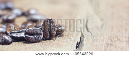 Coffee Beans  Texture  On The Wood Background