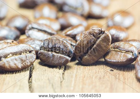 Coffee Beans  Texture  On The Wood Background
