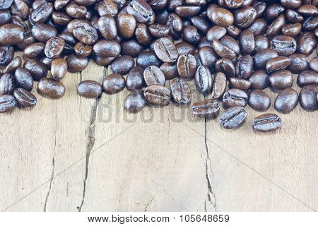 Coffee Beans  Texture  On The Wood Background