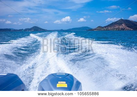 Water stream after speed boat. Summer landscape, a warm Sunny day on the Islands in Asia