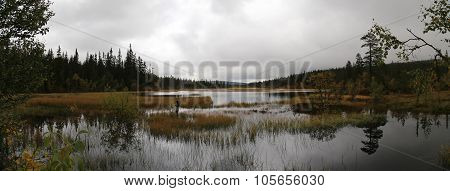 Panoramic View Of Myrflodammen Near Saelen, Sweden On A Rainy September Day