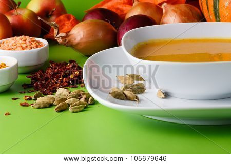 Pumpkin Soup With Onion And Pepper On Green Shadowless Backgroud