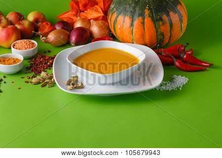 Pumpkin Soup With Onion And Pepper On Green Shadowless Backgroud