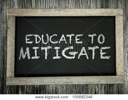 Educate to Mitigate written on chalkboard