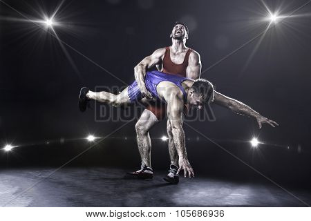 Freestyle wrestler throwing