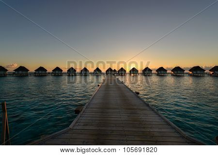 Sunset Moment At Luxury Resort, Wooden Walkway To Water Villa Bungalow, Maldives
