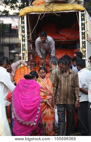 Pune, India - October 21, 2015: Unloading Flowers