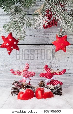 Christmas still life decoration with cariboo on wooden background