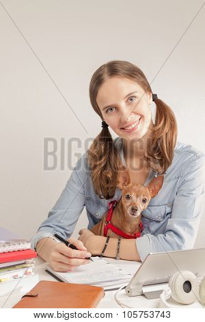 The Student Girl With A Small Dog