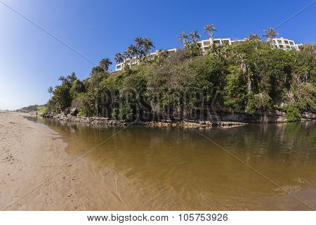 Beach Lagoon Rocky Cliffs