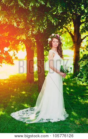beautiful bride holding a wedding bouquet